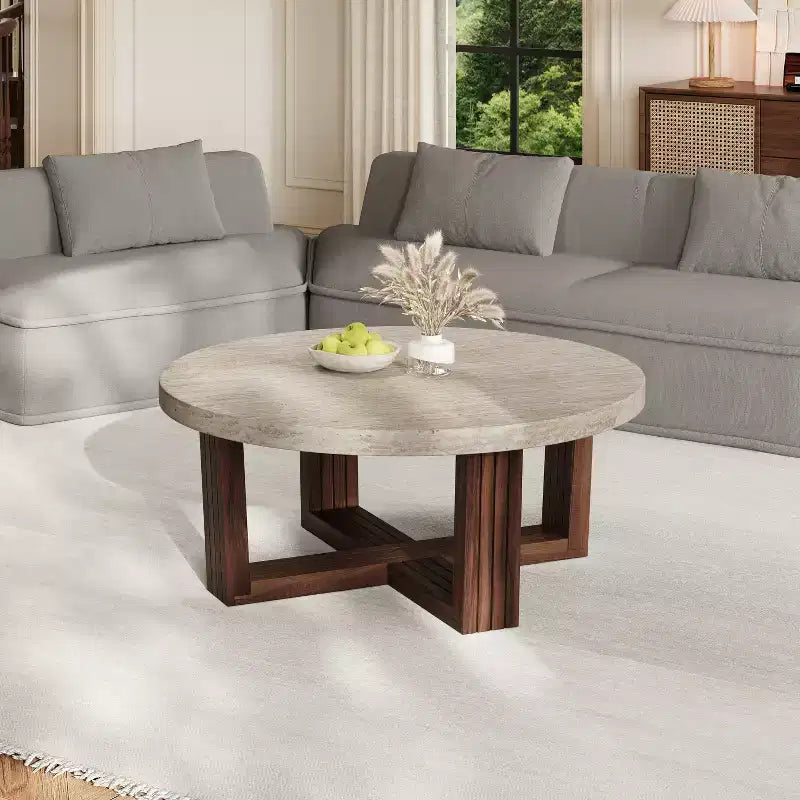 Table basse ronde moderne avec plateau à motif marbre et piètement croisé